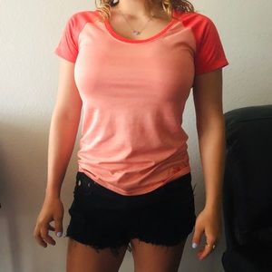 Pinkish red north face T-shirt